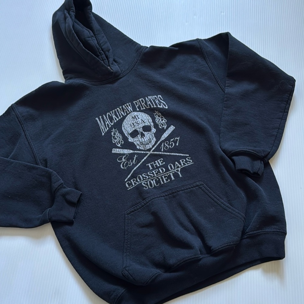 Mackinaw Pirates kid’s black hoodie. Youth Size large